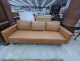Brown Leather-Style Sofa with Three Cushions and Metal Legs