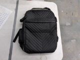 Black Quilted Backpack With Multiple Compartments and Adjustable Straps