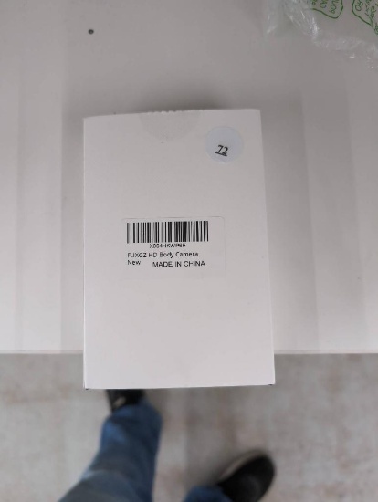 Portable Black Smart Device with Instructions and Packaging