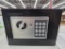 Small Electronic Safe With Dead Battery and Key Possibly Inside