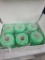 Six Green Adhesive Bandage Rolls