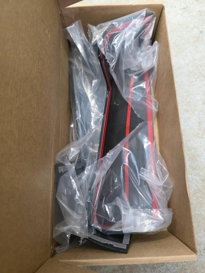 Black and Red Automotive Side Skirts in Original Packaging