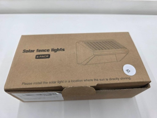 6-Pack Solar Fence Lights in Open Box with Manual and Accessories