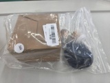 Bagged Set of Items Including Box, Plastic Components, and Black Circular Item