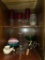 Contents of Bottom of Cabinet, Includes Decorative Items and Electronics,