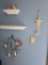 Contents on Wall Including Decorative Star, Branch Candle Holder, Ceramic Dog, and Ornamental Sph...