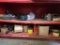 Red Metal Tool Cabinet With Miscellaneous Tools and Supplies
