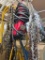 Lot Featuring Chainsaw Blades, Electrical Wires, and Light
