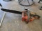 Craftsman Chainsaw with Red Housing and Black Blade