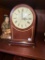 Wooden Mantel Clock with Roman Numerals and Brass Accents