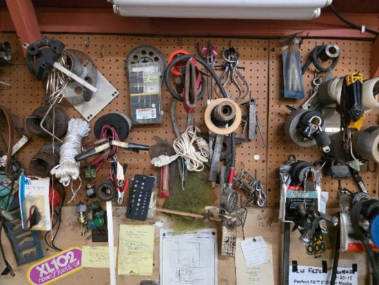 Contents of Wall with Tools, Cables, and Hardware