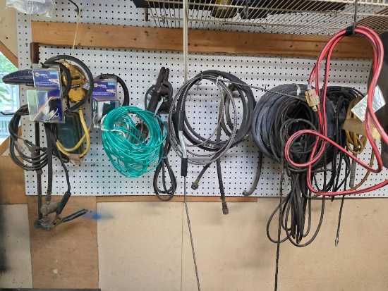 Lot of Wires, Chains, Tubing, and Accessories on Wall Pegboard