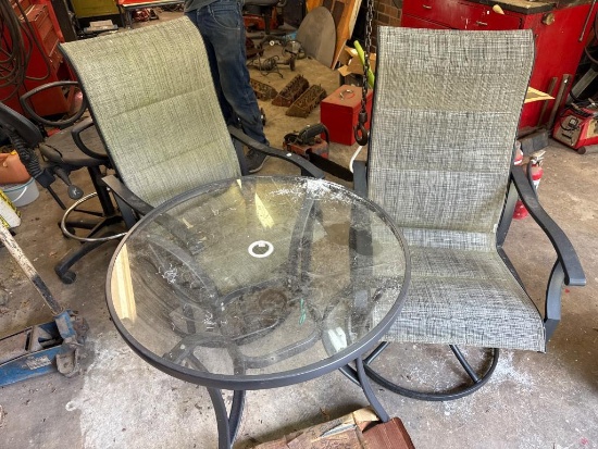 Patio Table and Chairs Set With Glass Top and Swivel Base Design