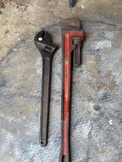 Two Tools To Include Adjustable Wrench and Pipe Wrench