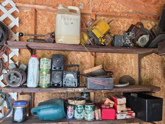 Wall Lot of Misc. Spark Plugs, Old Lawn Mower Parts, Radio, Water Can, and More