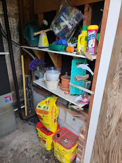 Contents of Small Shed with Christmas Decorations, Yard Supplies, and Pots
