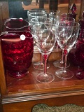 7 Ruby and Clear Glassware Items with Varied Sizes