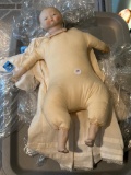 Porcelain Baby Doll with Cloth Body and Approximately 17 Inches Long