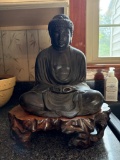 Seated Buddha Sculpture on Wooden Base, Measures Approximately 12 in x 15 in,