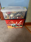 2 Totes with Assorted Toys Including Vehicles and Figurines ()