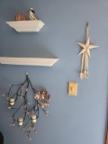 Contents on Wall Including Decorative Star, Branch Candle Holder, Ceramic Dog, and Ornamental Sph...