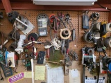 Contents of Wall with Tools, Cables, and Hardware