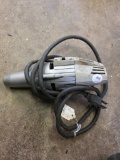 Electric Handheld Power Tool with Metal Housing and Attached Cord