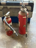 Two Red Fire Extinguishers