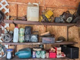 Wall Lot of Misc. Spark Plugs, Old Lawn Mower Parts, Radio, Water Can, and More