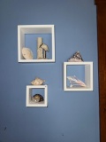 Floating Shelves with Contents Including Ceramic and Shell Decor,