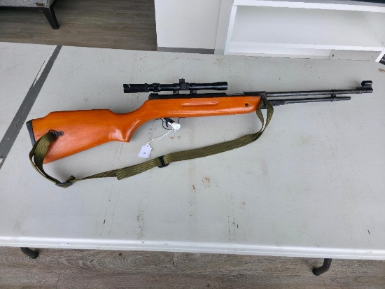 Chinese Pellet Rifle, No Model, No SN#. Has wooden Stock is in great condition.