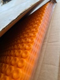Open Box with 5 Subflooring Tiles with Raised Orange Hexagonal Design