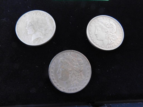 2 Morgans and 1 Peace Silver Dollar