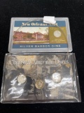 two Barber dimes two Mercury dimes, one of which is on a necklace