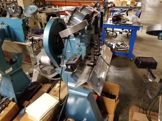 Interlake multiple head flat book saddle stitcher. Serial number 1037. 115v single phase.