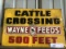 Tin Wayne Feeds Cattle Crossing Sign