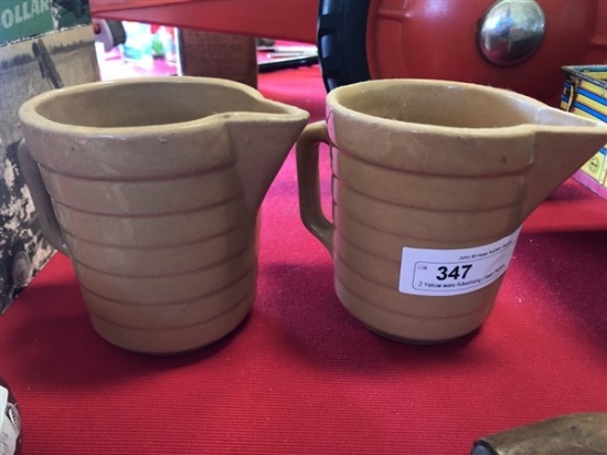 2 Yellow ware Advertising Cream Pitchers