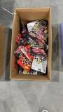 Approx 40 NASCAR cars in packages