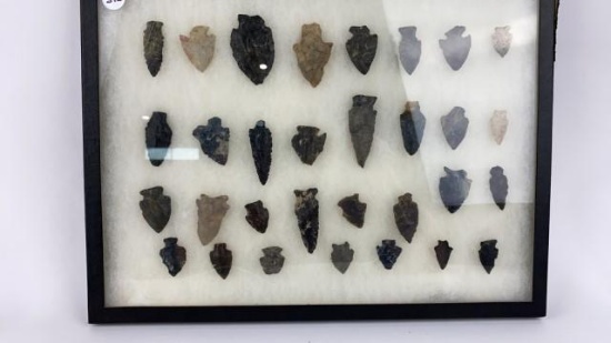 (31) Arrow Head Points in Frame