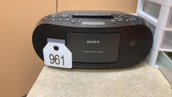 Sony Radio and Trash Can