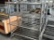 (2) 4' Rolling Stainless Racks & Coat Racks