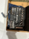 Assorted wrenches and sockets