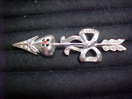 Silvertone rhinestone arrow pin