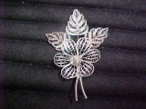 Pretty filigree leaf brooch