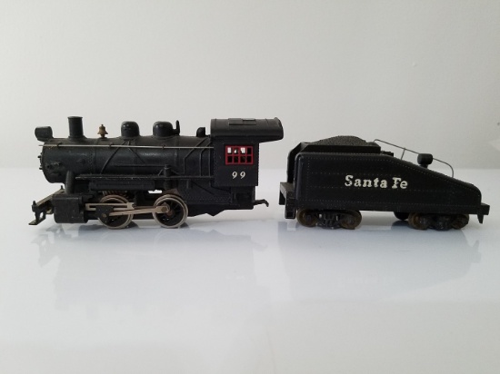 Vintage small metal locomotive w/ tender