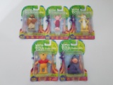 5 different Winnie the Pooh characters