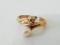 Rhinestone and faux pearl ring