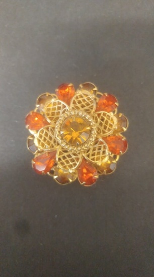Orange rhinestone brooch