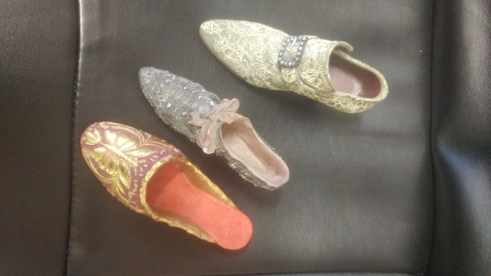 Lot of resin ladies fashion shoe figurines