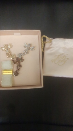 Kirks Folly angel scatter pins in box